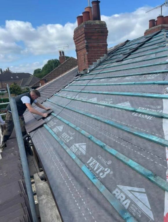 One of our lads working on a new Roof
